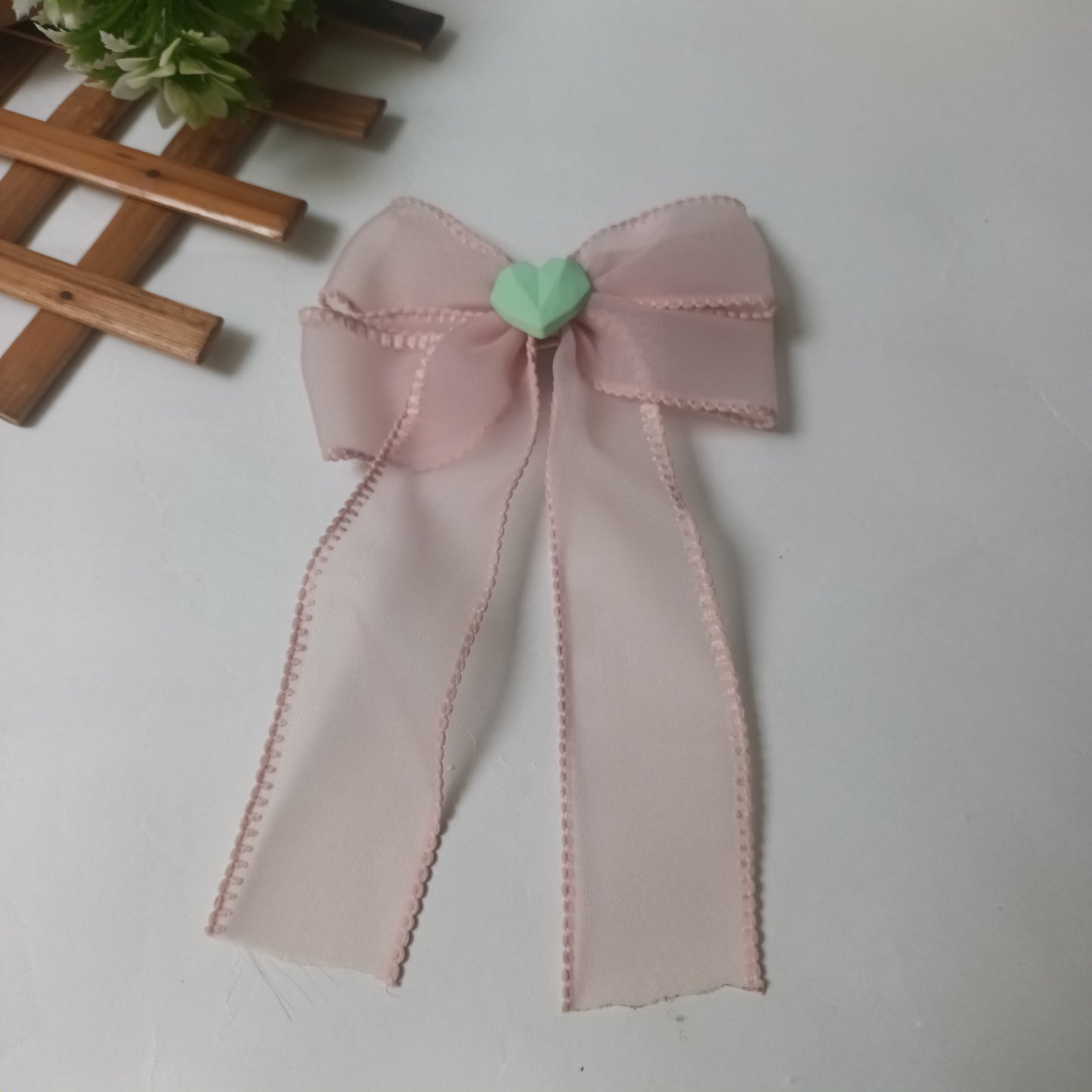 Alvina pastel pink organza bow aligator pin