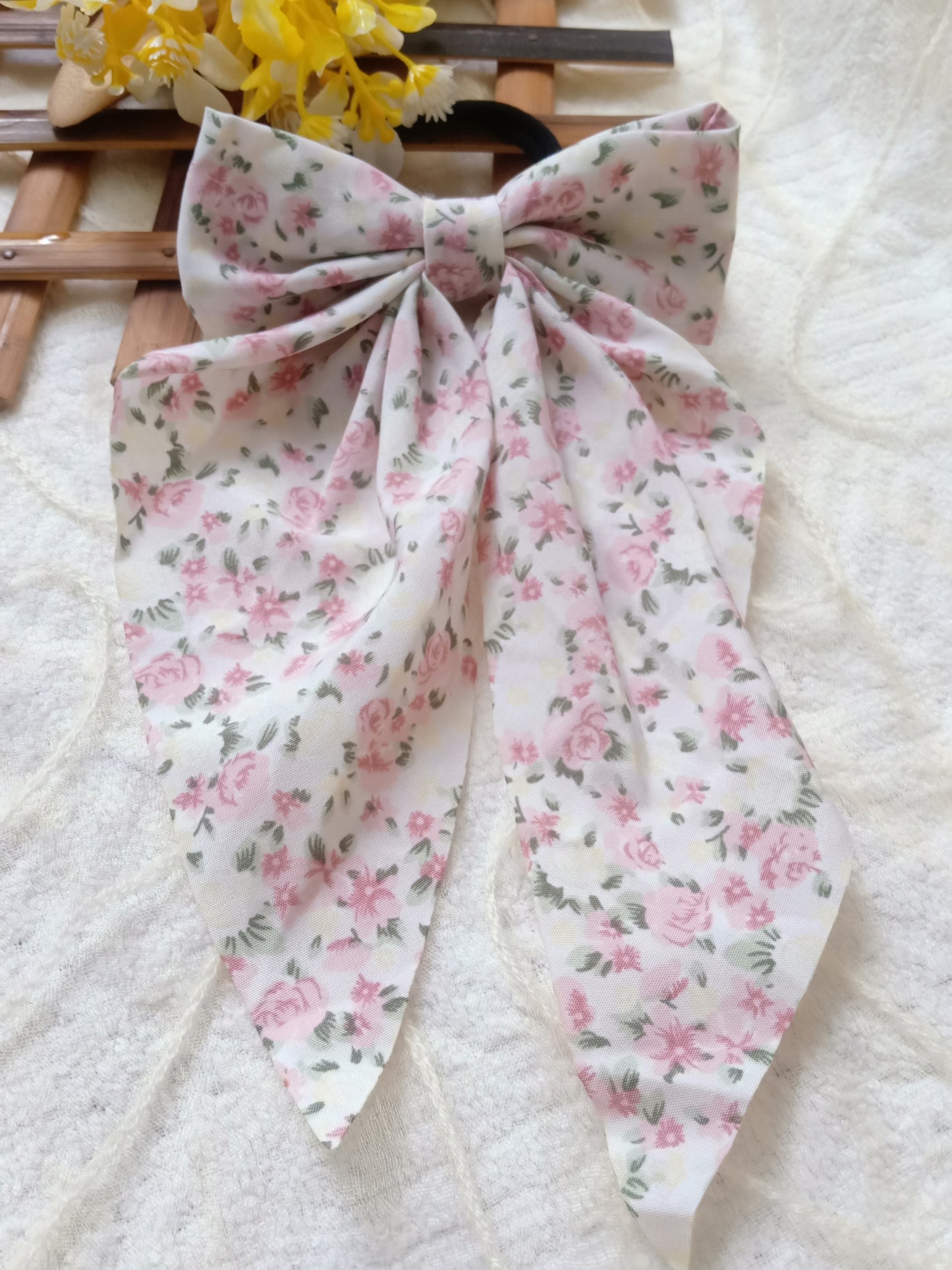 Raahat baby pink printed bow rubber band